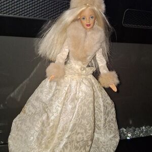 Elegant Doll in Cream Gown